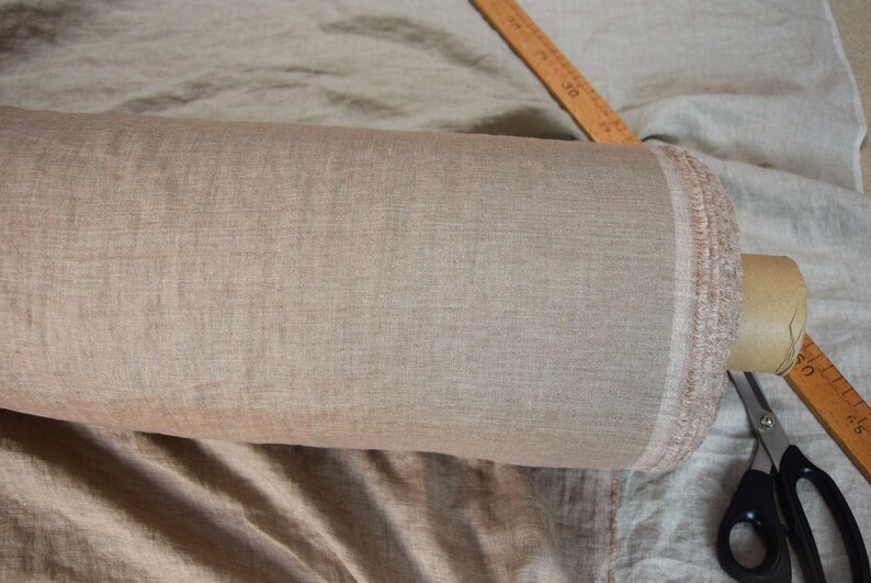 Pure linen fabric Margarita Rose Smoke - middle weight, dense, not sheer, soft. The color is pastel muted brownish-grayish melange chambray with a strong rosy tint. Drape characteristic are very good.