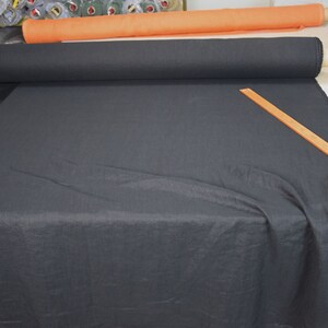 Pure linen fabric Gloria Black. Middle weight and middle thicknes, plain weave. The fabric is dense, not sheer, soft. Drape characteristic are good. Rich and deep black colour.