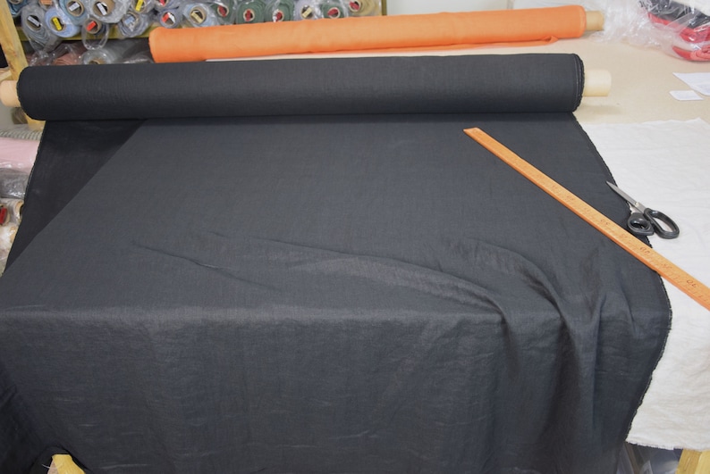 Pure linen fabric Gloria Black. Middle weight and middle thicknes, plain weave. The fabric is dense, not sheer, soft. Drape characteristic are good. Rich and deep black colour.