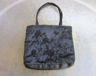 Vintage small black satin handbag, signed Charabia, by Ipa Nima, hand embroidered flowers