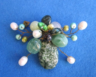 Huge assemblage green mixed media flying insect brooch