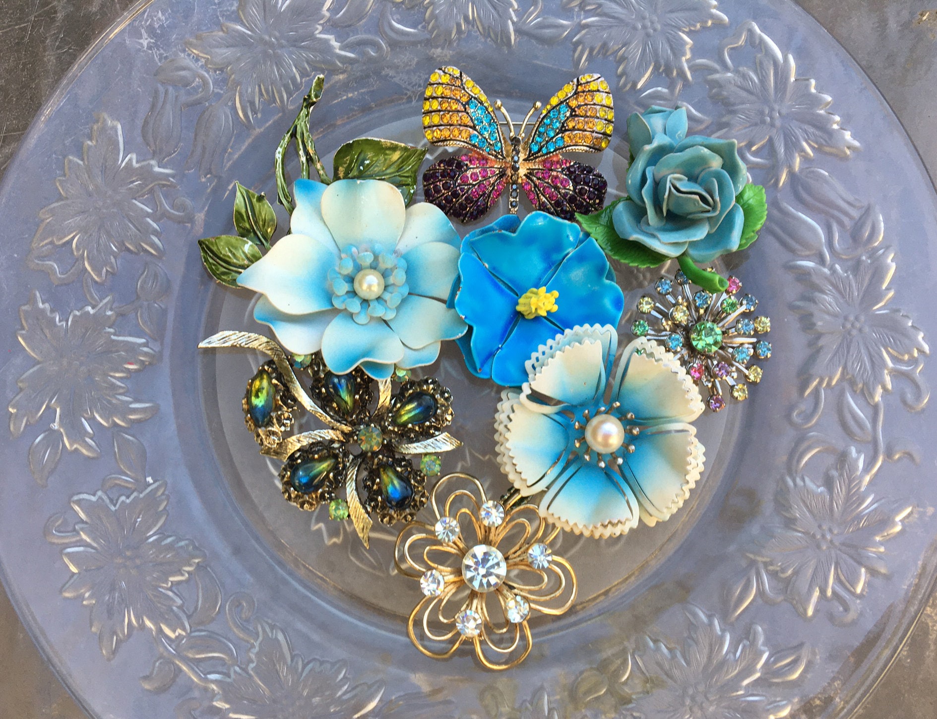 Aqua Open Flower Brooch with Aqua Blue and Green Rhinestones in The Center of Lovely Curled Petals Lined with Clear Rhinestones