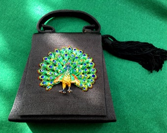Vintage signed Iris Lane black purse with huge metal peacock decoration