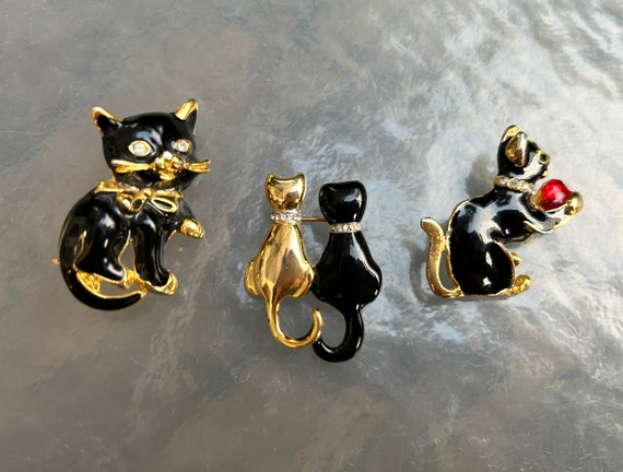 3 petite vintage black enamel cat brooches with r… - image 2