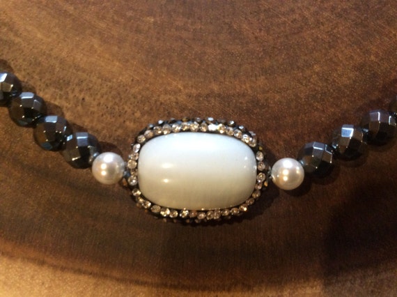 shell bead necklace with black and gold sahri thread Intertwined hematite