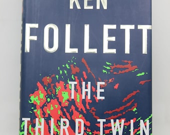 El tercer gemelo, primera edición firmada por Ken Follett.
