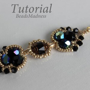 May include: Gold beaded earrings with black and iridescent glass beads. The earrings are long and dangle. The beads are arranged in a pattern of three hearts. The earrings are called "Tutorial BeadsMadness".