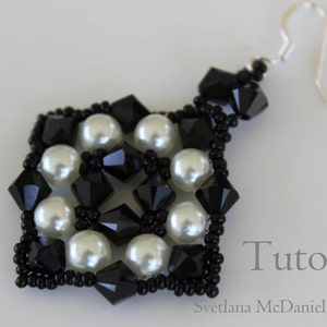 May include: A handmade earring featuring a square design with black and white beads. The earring is composed of black faceted beads, white pearl beads, and small black seed beads. The word "Tutorial" is visible in the image.