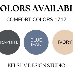 May include: Image showing three circular colour swatches: Graphite, Blue Jean, and Ivory. The text "COLORS AVAILABLE" is at the top, with "COMFORT COLORS 1717" below it. The text "KELSLIV DESIGN STUDIO" is at the bottom.