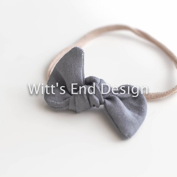 One Size Fits All- Top Knot Elastic Headband/Bow Collection- Charcoal on nylon or metal clip