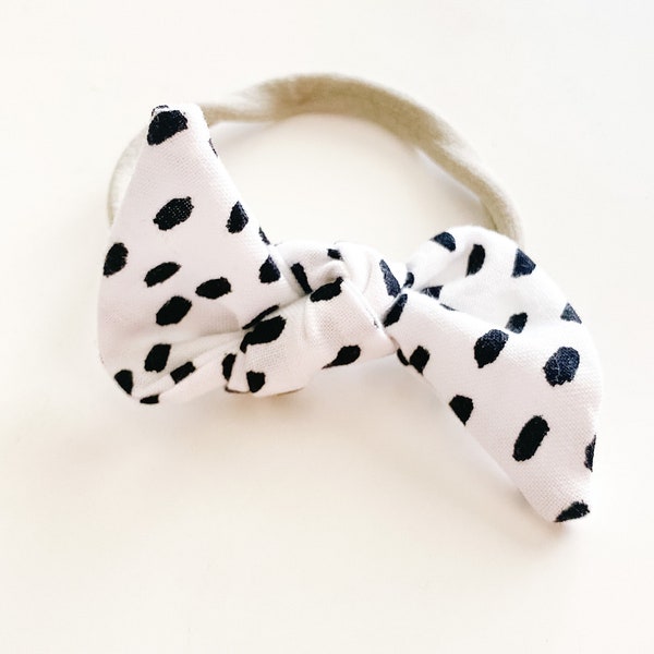 One Size Fits All- Top Knot Elastic Headband/Bow Collection- Scattered Black Dots on nylon or metal clip