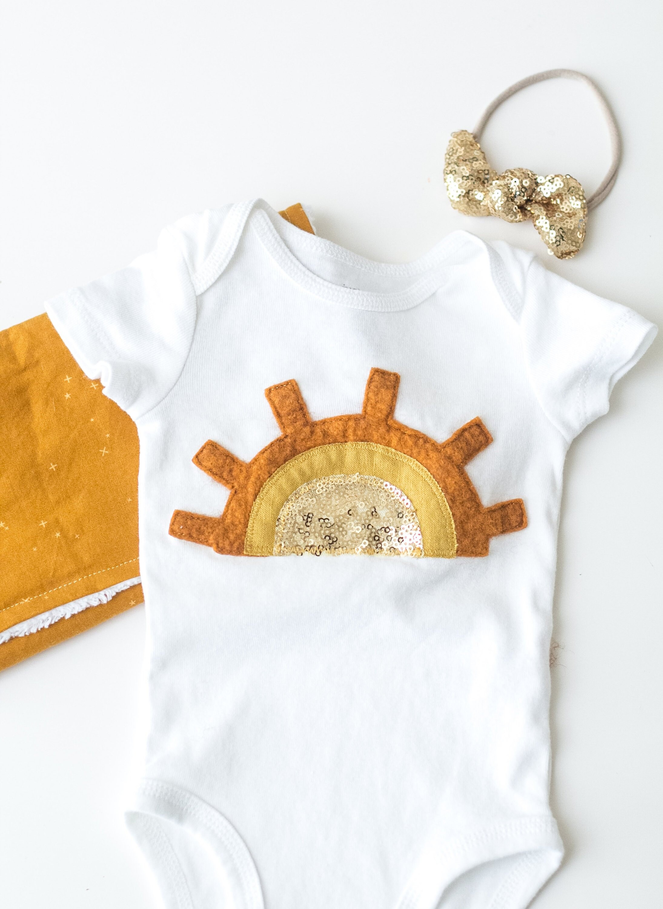 gold sequin onesie