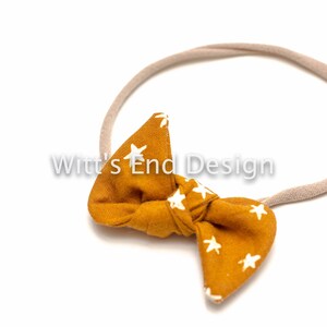 One Size Fits All- Top Knot Elastic Headband/Bow Collection- Starry Earth on nylon or metal clip