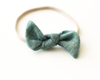 Groenblijvende hoofdband met glanzende strik: knoop, nylon of clip