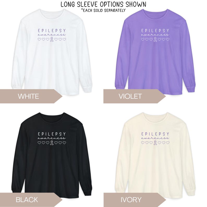 Pu&ograve; includere: Quattro magliette a maniche lunghe in bianco, viola, nero e avorio. Ogni maglietta presenta la scritta "EPILEPSY awareness" con un nastro e cuori. Le magliette sono esposte con etichette colorate.