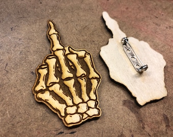 Skelly finger pin