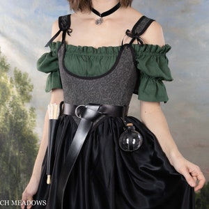 Potion Bottle Holder shown with renaissance costume, attached to belt alongside decorative corset and dress