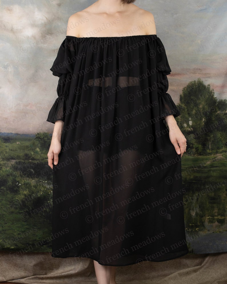 Black Chiffon Long Sleeve Chemise shown off-shoulder with flowing fabric against pastoral backdrop