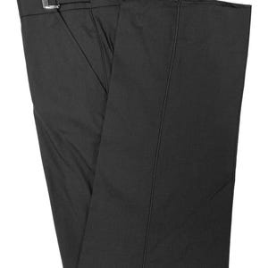 May include: A pair of black dress pants with a belt loop and a silver buckle.