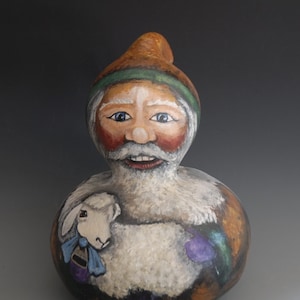 Hand Painted Santa holding a lamb