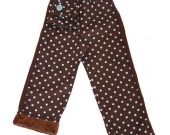 May include: Brown corduroy pants with a blue polka dot pattern. The pants have a brown fleece lining and a single pocket on the front.