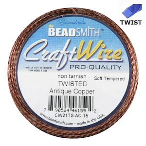 May include: A spool of antique copper CraftWire twisted wire, non-tarnish and soft tempered. The label reads "the Beadsmith CraftWire Pro-Quality non tarnish TWISTED Antique Copper Soft Tempered" with a barcode and the product code "CW21TS-AC-15".