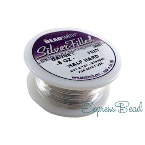 May include: A spool of silver-filled wire, labeled "Beadsmith Silver-Filled Pro-Quality Silver-Bonded Wire .5 oz - 5 Gauge - Half Hard - Feet - Not a toy, intended for adult use. www.beadsmith.com - Made in the USA"