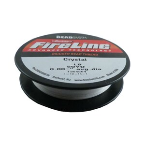 May include: A spool of white FireLine Crystal braided bead thread. The spool is labeled with the brand name, product name, and details like 0.00 LB, 50 YD, avg. dia 1364864, 1-19-14-1, The Beadsmith, Carteret, NJ, www.beadsmith.com, Made in USA.