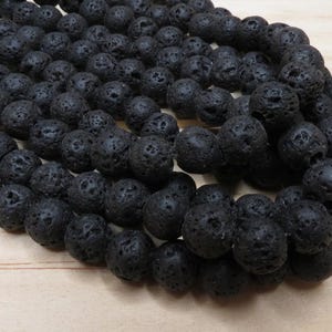 Natürlicher Lavastein Perlenstrang, rund, 10 mm, schwarz