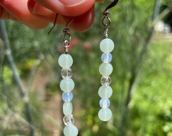 Beaded dangle earrings / Iridescent green