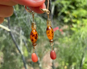 Beaded dangle earrings / Browns