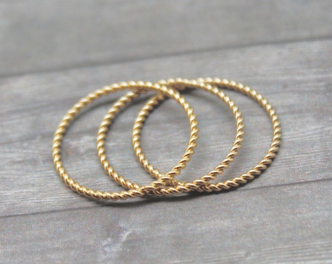 Twisted Stacking Rings