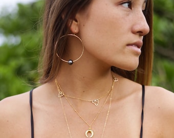 Aros de perlas tahitianas