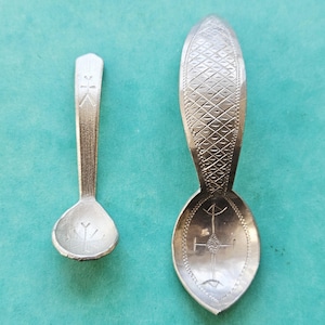 Two Swedish pewter salt spoons