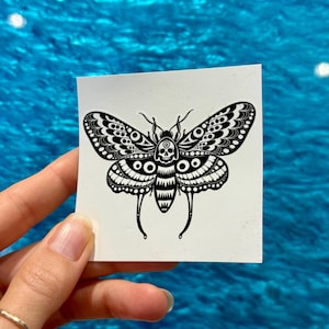 tatuaje temporal de mariposa