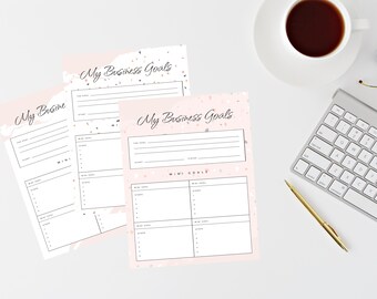 May include: Three printable business goal worksheets with a pink background and a confetti pattern. The worksheets have sections for big goals, mini goals, and steps to take.