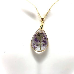 Gorgeous Tear Drop Purple Dried Flowers Resin Pendant On A Silver-Plated Chain