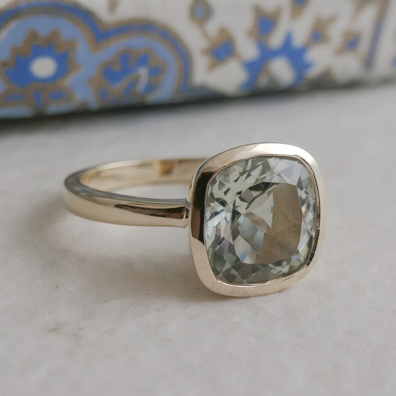 Green Amethyst Statement Ring Natural Stone Crystal Cushion Cut Design Sterling Silver Band Yellow Gold Plated Bezel Setting Handpicked Gemstone Quality Premium Jewelry Collection Special Occasion Piece Elegant Statement Accessory Beautiful