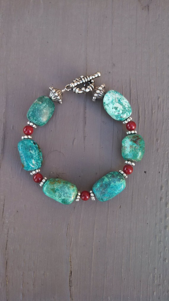 Items similar to Genuine turquoise, silver and red glass bead bracelet