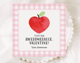 May include: Pink and white gingham printable Valentine's Day card with a red heart-shaped apple and the text "You're awesomesauce. Valentine! Love, Emmerson."