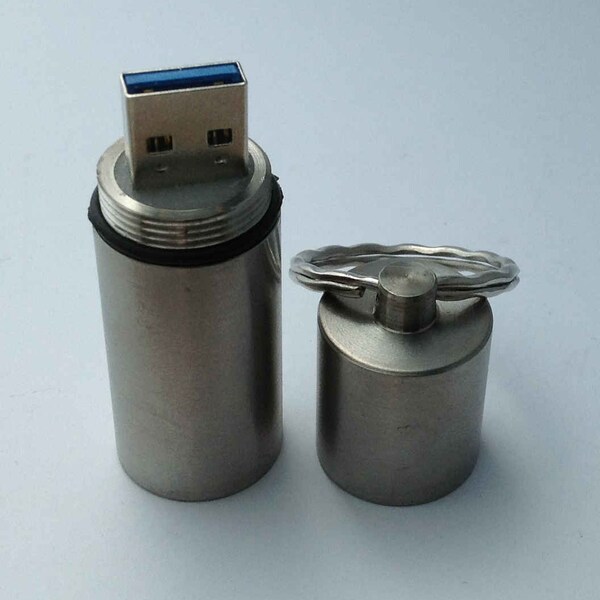 DISCOUNTED -- Flash Drive in Titanium EternalCase - indestructible flash drive, waterproof, shock & drop proof, survives high temperature.
