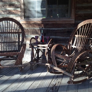 Matching pair of king size willow rockers and end table