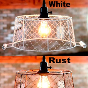May include: Two pendant lights with wire mesh shades. One is white, the other is rust-colored. Each has a black fixture and a visible lightbulb. The word "White" is above the white lamp, and "Rust" is above the rust-colored lamp.
