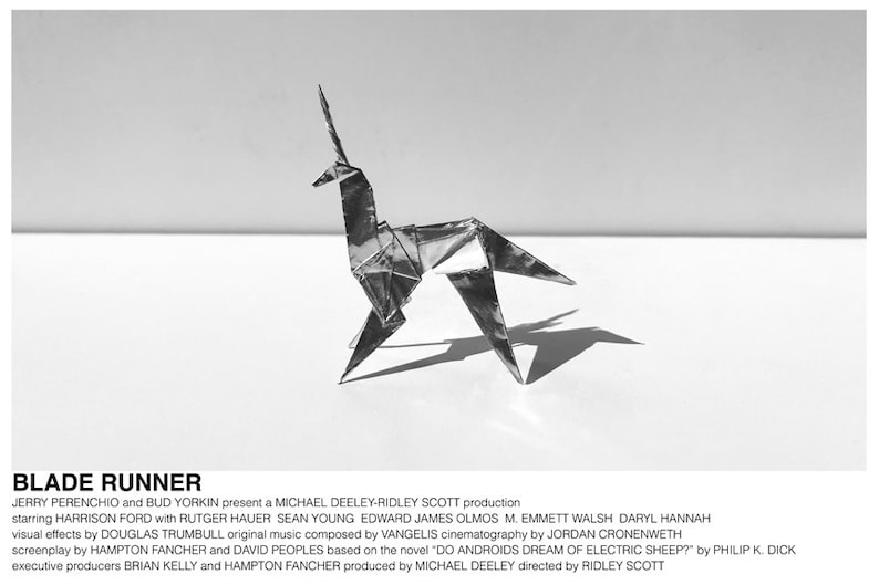 May include: A black and white poster for the movie Blade Runner. The poster features a folded paper origami unicorn in the center of the poster. The text on the poster reads "Blade Runner" and lists the cast and crew of the film.