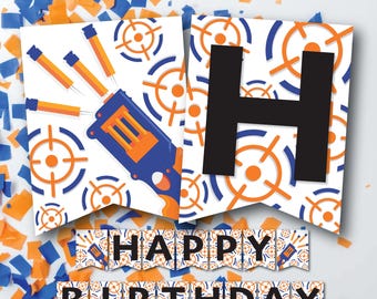 May include: A festive birthday banner with a blue and orange toy gun and target design. The banner spells out "HAPPY BIRTHDAY" in bold letters. Confetti in matching colors surrounds the banner, creating a celebratory atmosphere.