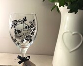 Rock Roll Gift UK- White Skeleton Skull Hand Painted Wine Glass Black Roses. Gifts for skeleton girls and skeleton boys.