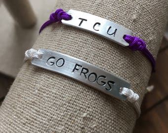 TCU / Hand Stamped bar on adjustable dainty cording  / Texas Christian / Purple and White Qty -1