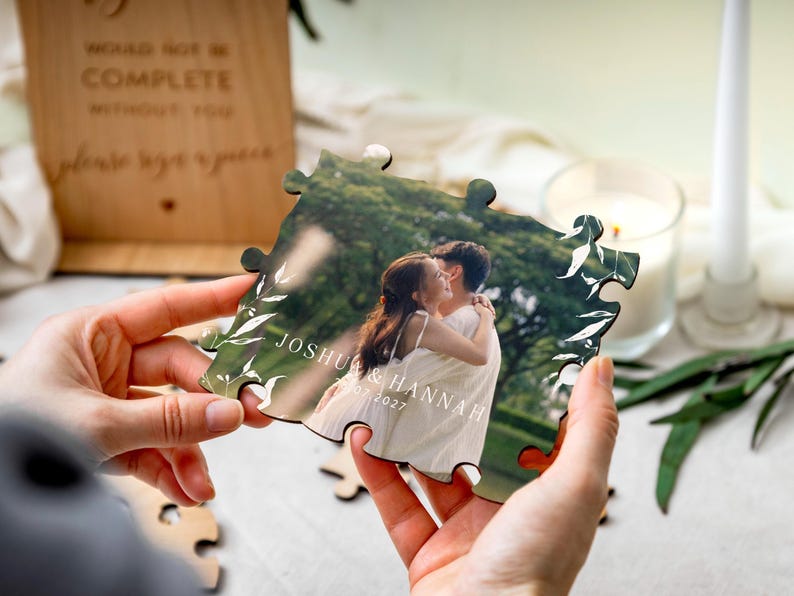 Detailed view of the interlocking laser-cut wooden jigsaw pieces on the UV-printed wooden photo wedding guest book alternative, highlighting the smooth signing surface for guest messages.