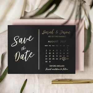 Folie-kalender voor het opslaan van de datums, minimalistische zwarte kaarten voor het opslaan van de datum, goudverijdelde trouwkaarten, gratis enveloppen 'Dubai'