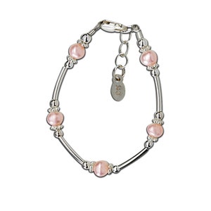 Sterling silver bracelet with long silver beads accented with pink pearls.